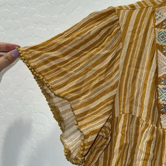 Peplum yellow shirt with embroidery. - Picture 3 of 4